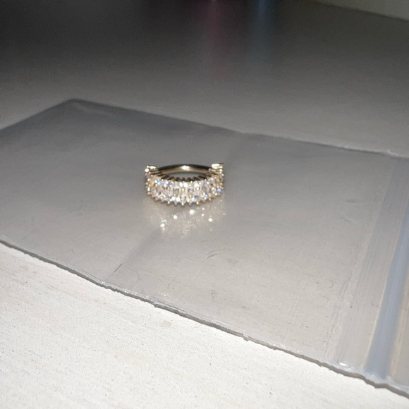 14k gold diamond earring one single hoop.
